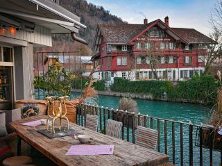 Riverside Retreat: A Serene Café Experience in Interlaken