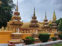 Be calm and enjoy the glow of the golden reclining Buddha in Laos! 
