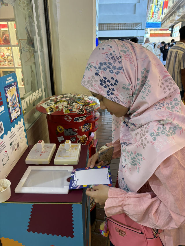 free postcard stamping at Pasar Seni