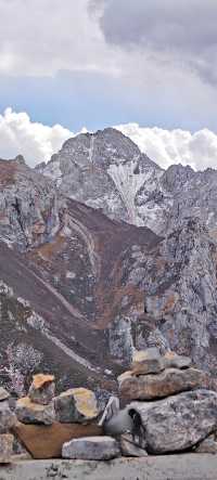 不去這山就去納山