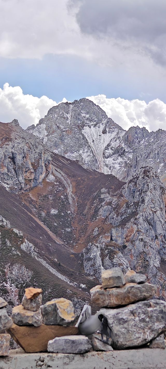 不去這山就去納山
