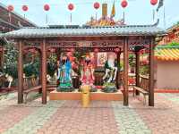 Whimsical Wonders: Discover the Majestic Dragon Sculpture at 8 Chinese Temple Village