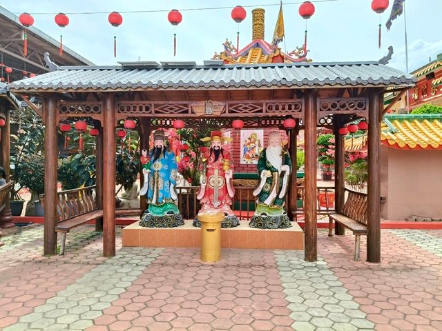 Whimsical Wonders: Discover the Majestic Dragon Sculpture at 8 Chinese Temple Village