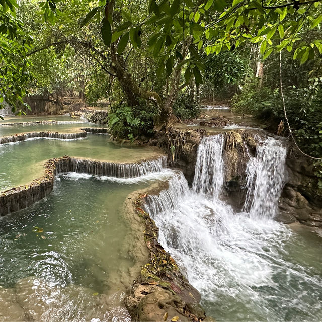 🌿 Kuangsi Falls is nature's masterpiece