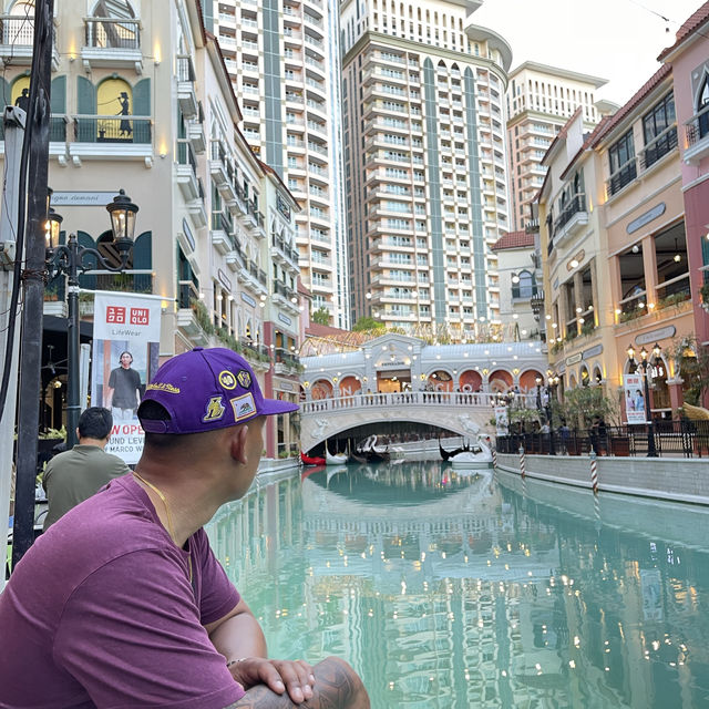 Navigating the venice canal wharf in Manila