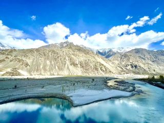 A modern capital city with a peaceful green atmosphere