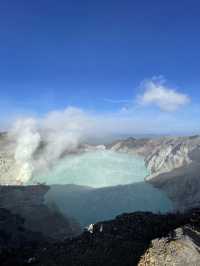 The Turquoise Crater Lake Above the Clouds