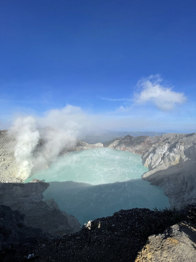 The Turquoise Crater Lake Above the Clouds The Turquoise Crater Lake Above the Clouds