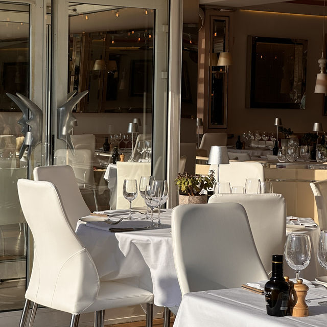 Upscale dining paired by a port view!