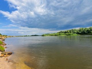 Nature lovers, listen up! If you’re craving refreshing swims and river views that vibe all day, Retchitsa by the Dnepr river is a total hidden gem 🌊🌿 The riverbank is the real highlight—think soft grass, easy access water, and quiet spots to chill, plus epic sunset scenes you don’t have to fight crowds for.

Top Spots to Visit:
1. Dnepr River Bank – Main beach area is near Pobedy Park (ул. Победы, open all day). This spot is super local and clean, with plenty of space for picnics and sunbathing.
2. Pobedy Park – Right next to the river, this park is perfect for lazy walks, birdwatching, or just soaking up the peaceful Retchitsa vibe.
3. Old Footbridge – For great photos, head toward the old bridge section at Sovetskaya Street—sunrise and sunset views here are unbeatable.

Travel Insights & Tips:
– The river is surprisingly clean and shallow near the banks, so it’s perfect even if you’re not an expert swimmer.
– Locals are friendly but don’t expect much English—bring basic phrases or a translation app!
– Bring your own snacks, sunscreen, and a blanket because riverside amenities are zero, but that’s part of the chill charm.
– Bug spray is a must after dark.

Getting Around:
– Retchitsa is walkable. Most spots are within 15-20 min stroll from the town center and main bus station. Taxis are cheap if you need wheels.
Local Eats:
– Try “Chaika” café next to the river for classic Belarusian snacks and cold drinks.
Weather:
– Summers are hot! May to early September is best for swimming.
#DneprDream  #BelarusNature  #SwimSpots  #HiddenGems 