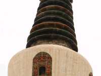 there is a temple hanging from the mountain...