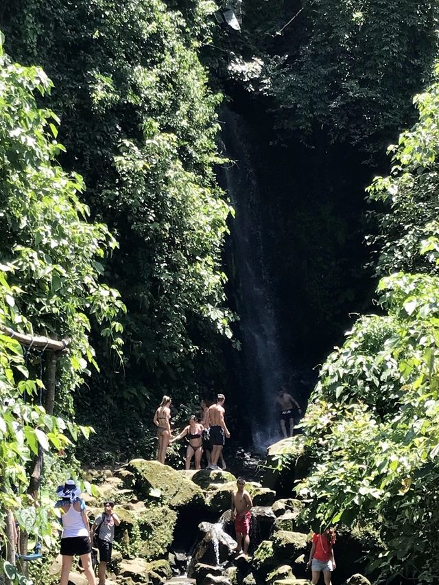 Swim at the Base of the Waterfall in Bali