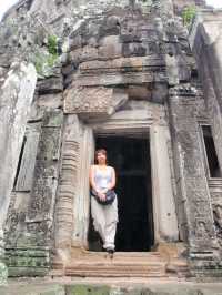 Whispers of Stone: A Morning at Bayon Temple