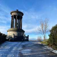 Carlton hill Edinburgh snow , night and day view up in a mountain 