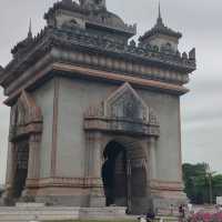 Ascending to Elegance: Patuxay's Embrace Above Vientiane