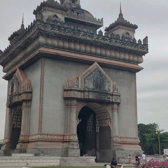 Ascending to Elegance: Patuxay's Embrace Above Vientiane