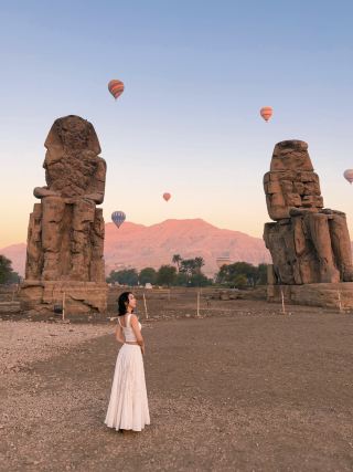 Morning View of Ruins and Hot Air Balloons in Egypt