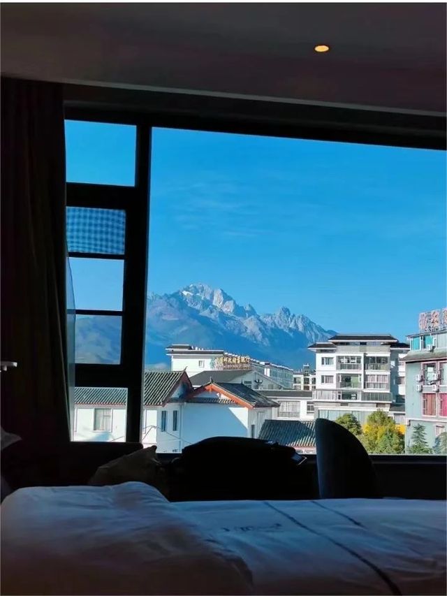 麗江古城性價比酒店，躺著看日照金山