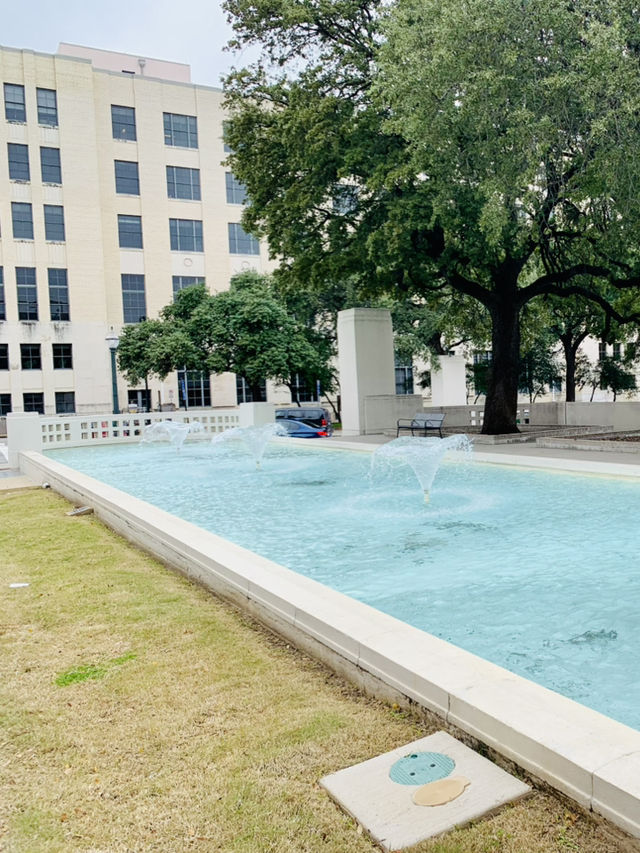 “Reflect at the John F. Kennedy Memorial in Dallas”