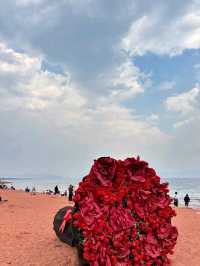 Red Sand Beach: Spring’s Crimson Canvas