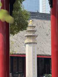 Serene temple next to busy Taikoo Li
