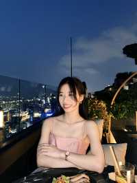 Pink dress with Mahanakhon sunset