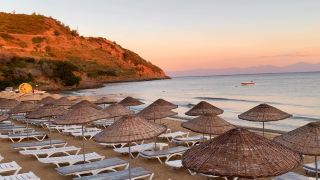 Golden Sands & Glorious Sunsets: Discover the Beauty of Aria Claros Beach