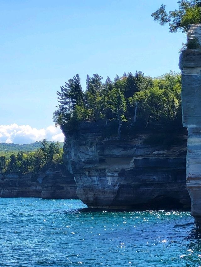 Discover the wild beauty of the crystal blue water and sandstone cliffs along Lake Superior in MI