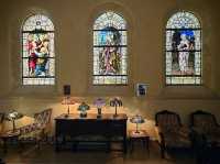Bright stained glass and the beauty of the stone building
