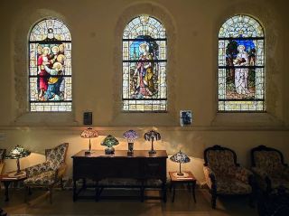Bright stained glass and the beauty of the stone building