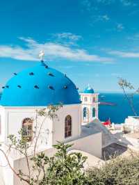 Santorini, Greece – Blue Domes and Endless Skies