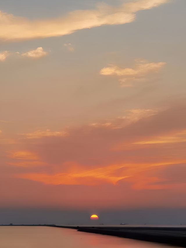 啟東日出。