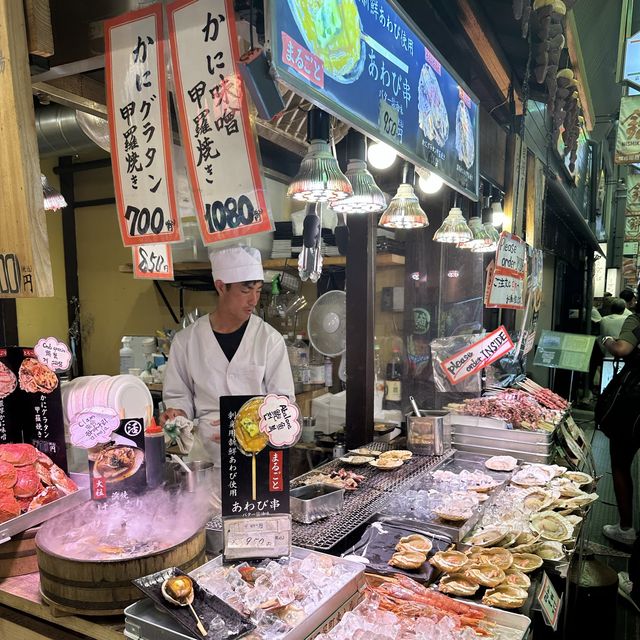 Colourful street market with many shops