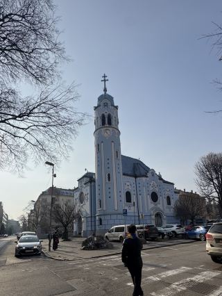A blue church that looks like it came straight out of a fairy tale