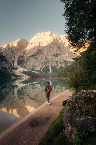 Lake Blaise in Italy 💎 The emerald waters and majestic mountain cliffs of the Dolomites offer a scenic experience worth slowing down for.