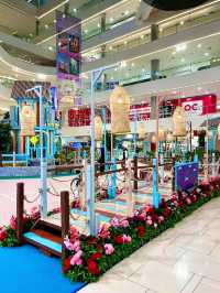 “Quill Mall Glows in Blue: A Radiant Hari Raya Celebration”