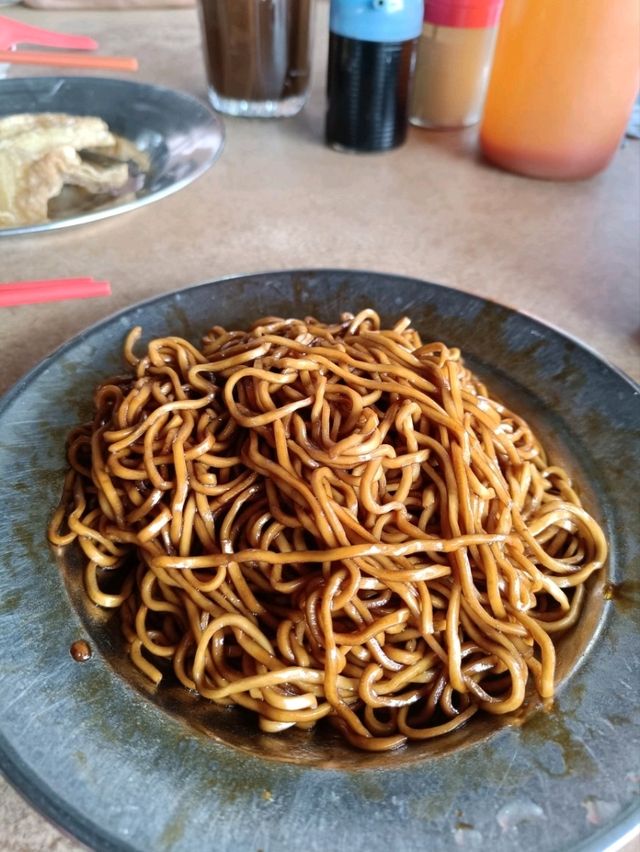 Discover the Irresistible Charm of Dirty Noodles: A Culinary Gem in Lukut near Port Dickson