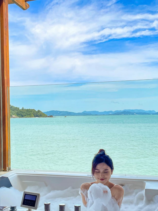 rainforest setting, over-water chalets, private beach, and friendly service