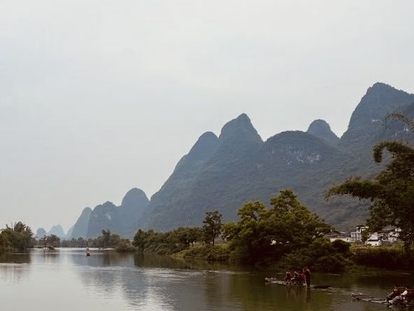 Yulong River (遇龙河)** in Yangshuo, China – a serene paradise of karst landscapes, bamboo rafting, and