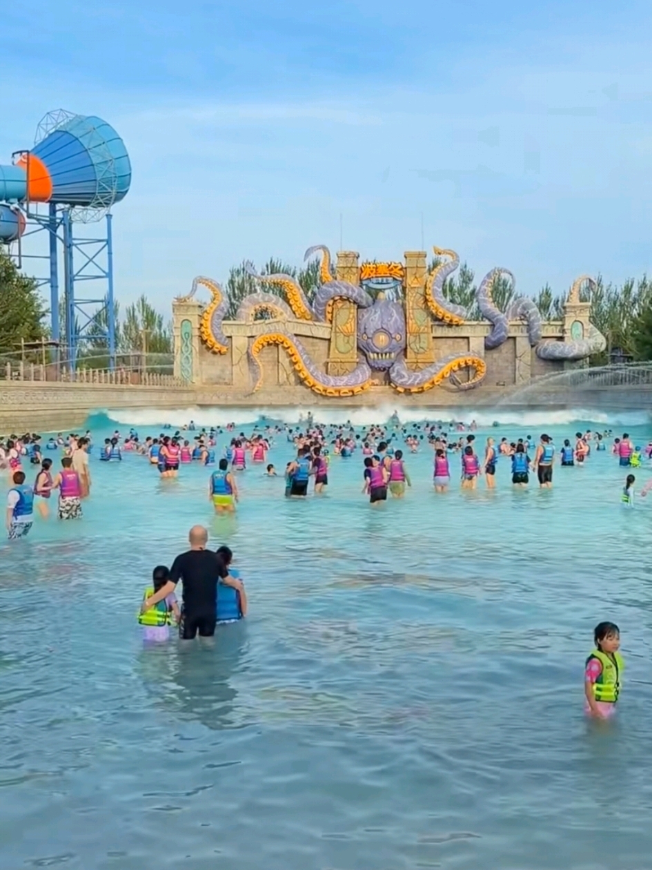 Harbin's Poseidon Sea Kingdom Complex

#harbin

If you're visiting Harbin and looking to escape the cold, enjoy water activities, see marine life, and have a great time with the whole family, the Poseidon Sea Kingdom Complex is the perfect choice. This year-round entertainment center features a large indoor water park, an aquarium, a spa area, and numerous themed areas, ensuring you stay indoors even in the bitter cold of northern China.

General Description of the Location

Full Chinese Name: Hā'ěrbīn Bōsāidōng Hǎiyáng Wángguó (Harbin Suburb)
Location: Suburb of Harbin, close to the city center, easily accessible by taxi or city bus. The main advantage for tourists from Russia: all areas are enclosed, the indoor temperature remains at 26-28 degrees Celsius year-round, and the water in the pools is heated to a comfortable temperature. Even in January and February, when it's -25 degrees Celsius outside, it's warm and cozy.

All areas of the complex worth visiting

1. Indoor water park (the main feature of the complex)

The largest part of the entertainment center, divided into areas for adults and children.

· Extreme water slides: high drops with turns, vertical drops for adrenaline junkies;

· Wave pool: artificial waves of varying heights are launched every half hour, with musical shows featuring hosts;

· Lazy river: a gentle rafting trip along a circular channel on inflatable rings, perfect for a relaxing holiday;

· Children's water playground: shallow pools, mini-slides, and water cannons for children aged 2 and up.

The entire water park is themed around ancient Greek marine myths: sculptures of Poseidon, tridents, underwater kingdom decor, and numerous vibrant photo zones.

2. Maritime Museum / Oceanarium

Many tourists come here specifically for the oceanarium; it rivals major city marine animal exhibits.

· A long underwater glass tunnel where you can walk beneath a school of fish, stingrays, and small sharks;

· Daily seal shows: performances with tricks, feedings, and photo opportunities with the animals after the show;

· An exhibition of rare seashells, fossilized sea creatures, and information boards with facts about the ocean.

3. Hot Mineral Baths (Spa) Area

Perfect for relaxation after active water activities. Dozens of baths with varying temperatures and water compositions: herbal, salt, and fruit pools. There are separate areas with steam saunas and relaxation rooms with soft loungers.

4. Dry Children's Park "Island of Joy"

If your child doesn't want to swim, there's a separate, enclosed, non-water play area with labyrinths, carousels, trampolines, and soft slides for toddlers. This is ideal for families with small children who want to alternate between water and dry activities.

5. Themed Pedestrian Area "Underwater City of Poseidon"

A spacious area for strolling and taking photos: giant statues of sea gods, decorated underwater caves, souvenir shops with a marine theme, a cafe, and quick snack bars. Here you can buy magnets, toys with sea animals, and gifts for friends.

Seasonal Winter Area: Ice Town

From November to March, a mini-park of ice and snow in a Greek style opens, featuring ice sculptures of Poseidon, small ice slides, and photo zones. A great addition for those visiting Harbin for winter ice fun.

How to get there from downtown Harbin

1. Taxi (the most convenient option for tourists)
From the city's central areas (St. Sophia Square, Central Street), the journey takes 30-40 minutes, and a one-way trip costs 60-90 yuan, depending on traffic. Suitable for a group of 3-4 people.

2. City bus (budget option)
Buses from Harbin Central Bus Station take you directly to the complex's entrance; a ticket costs only 5 yuan, and the journey takes about an hour. Cons: They don't run very frequently, so you'll have to adjust to the schedule.

Tickets: Types and Approximate Prices

On Trip, it's cheaper to buy combination tickets at once rather than paying for each area separately:

1. Full Day Pass (Water Park + Aquarium + Spa)
On weekdays: Adults 168 RMB, Children (up to 1.4 m) 98 RMB
On weekends and holidays, the price increases by 30-50 RMB

2. Limited Ticket (Aquarium Only)
For those who don't want to swim: Adults 88 RMB, Children 55 RMB

3. Family Package (2 adults + 1 child)
More economical than individual tickets, saving about 70 RMB for the whole family.

Important tip: Book Trip tickets in advance online—the price at the entrance to the complex is always higher than in the app.

On-site dining and service

The complex offers a variety of dining options to suit any budget:

· Fast food outlets serving Chinese street food: noodles, fried snacks, ice cream, and drinks;

· Full-service seafood restaurants: fresh fish and seafood, local Harbin dishes;

· A cafe in the themed area offering desserts and hot drinks.

There's also everything you need for a relaxing holiday: towel and snorkel rentals, storage facilities, restrooms, a medical center, and a tourist support hotline.

Pros and Cons of the Complex for Travelers

Pros

1. Completely enclosed areas—an ideal winter getaway in Harbin, no need to freeze outside;

2. A huge selection of activities for all ages: extreme sports for young people, relaxing relaxation for adults, and play areas for small children;

3. The Oceanarium with its seal show is a unique location, rarely found in water parks in northern China;

4. All areas are located in one complex, eliminating the need to travel from one location to another;

5. Convenient transportation from downtown Harbin; easy to find a taxi back to the city.

Cons

1. On Saturdays and Sundays, there are many local tourists, leading to queues for the slides and shows at the Oceanarium;

2. Food and souvenir prices inside the complex are slightly higher than in the city;

3. The Ice Town is only open during the cold season; this area is not open in the summer.

Recommended full-day itinerary

10:00 AM — Arrival at the complex, check in your luggage, and begin enjoying the water park
12:30 PM — Lunch at the on-site café
2:00 PM — Visit the aquarium, watch the seal show
4. 00 PM — Relax in the mineral baths and saunas
5. 30 PM — Stroll through the theme park, buy souvenirs
7:00 PM — Return to downtown Harbin

Helpful tips for tourists

1. The best time to visit: weekdays, in the morning — there are fewer people and no long lines;

2. Be sure to bring a swimsuit, flip-flops, and a swimming cap (you won't be allowed into the pools without a cap; buying one on site will be more expensive);

3. If you're traveling in winter, don't pack too many warm clothes — it's very hot inside the complex;

4. Check the seal show schedule at the entrance—they only take place 3-4 times a day;

5. Families with small children should visit the children's water area first, before the crowds get too crowded.