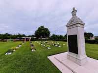 Labuan War Cemetery: Where History Whispers Among the Flowers 🌺✝️