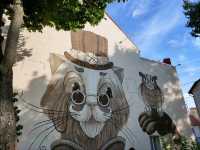 Seaside Strolls & Cat Statues