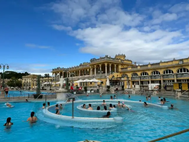 The Ultimate Bathing Ritual in a Palace: Széchenyi Thermal Bath, Budapest's Most Beautiful Pale Yellow Dream.