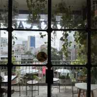🌿🏠☕️ Indulge in Tranquility and Charm at The Cafe Apartments in Ho Chi Minh City, Vietnam! 🌸🍃🍰