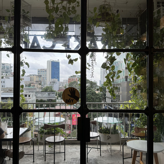🌿🏠☕️ Indulge in Tranquility and Charm at The Cafe Apartments in Ho Chi Minh City, Vietnam! 🌸🍃🍰