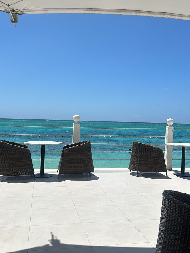 Chilling by the crystal blue sea in Jamaica 