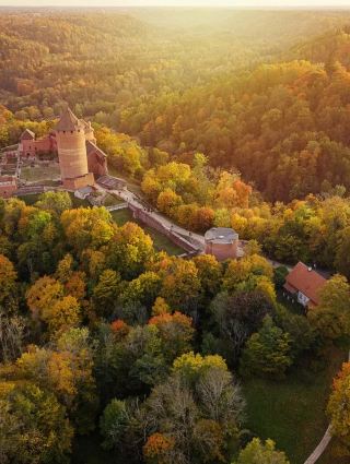Sigulda — The Latvian Town Where Three Castles Watch Over the Gauja Valley and Autumn Paints