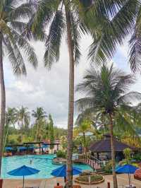 rainforest setting, over-water chalets, private beach, and friendly service