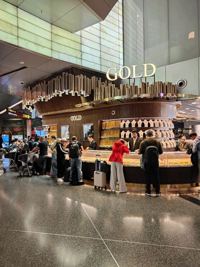 Between Benz and Bear: A Surreal Stroll Through Hamad Airport