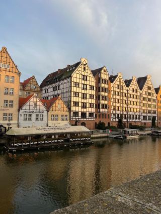 Just got back from Waterville and Gdansk with friends and I’ve got to say: the vibes are epic, especially if you love cozy canals and western-style architecture under hazy, rainy skies 🌧️✨ Here’s the best stuff we did, and some pro tips to make your own trip smoother!

Must-See Places in Gdansk:
1. Christmas Market (Targ Węglowy, 80-980 Gdańsk, Poland | Nov-Dec, 12pm–8pm): Grab mulled wine and locally-made sweets, and get lost in the festive energy. Insider scoop: Visit early afternoon to dodge the dinner rush!
2. Canalside Walk (along Motława River, near Długie Pobrzeże): Stroll the iconic canals lined with red-brick buildings. Even on a cloudy or rainy day, the reflections are stunning for photos (umbrella totally recommended ☔️).
3. European Solidarity Centre (pl. Solidarności 1, 80-863 Gdańsk | 10am–6pm): History buffs, this is your spot. Interactive, English-friendly exhibits.

Waterville Highlights:
- Canal View: Take it slow by the tranquil canal edged with classic western architecture. It’s perfect for outdoor strolls, especially on a cloudy day if you’re into moody travel vibes.
- Local Cafés: Find a spot near the water for hot chocolate or hearty Polish soups. Rainy days are best spent sipping and people-watching.

Getting Around:
Use local trams and buses—cheap and easy. In Gdansk, download Jakdojade for routes on the go.

Food Recommendations:
- Sample the pierogi at Pierogarnia Stary Młyn (ul. Straganiarska 21, Gdańsk).
- For a quick canal-side snack, grab zapiekanka from a market stall.
- Don’t miss the gingerbread at the Christmas Market!

Quick Tips:
Cash and cards both work, but small bills help at stalls.
Dress warm and pack layers for gloomy days.
No visa needed for EU or Schengen passport holders.

#TravelPoland #WatervilleViews #CanalVibes #GdanskTips